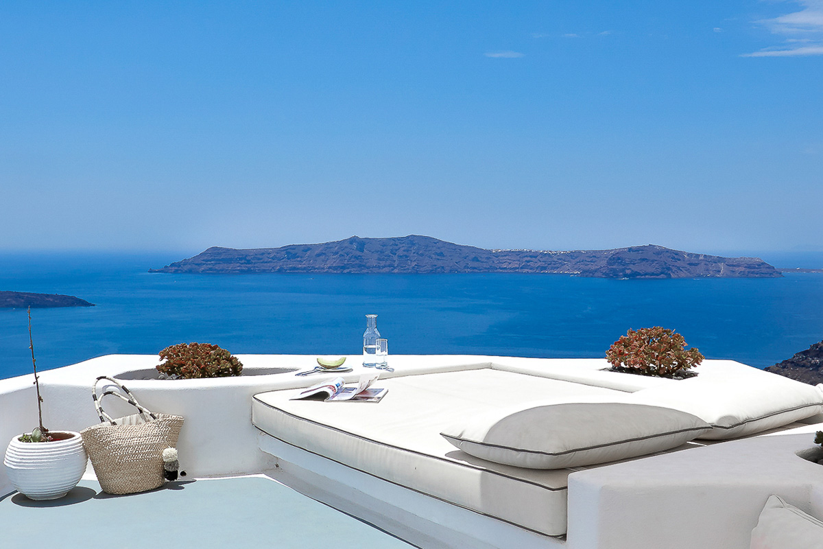 Therasia island, a view from a suite's terrace in Dana Villas, Santorini