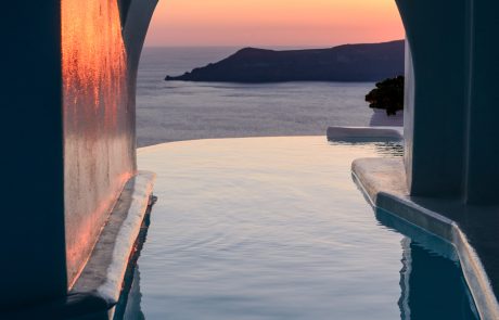 Snapshot captures the view through the cave pool of Dana Villas as the sun sets