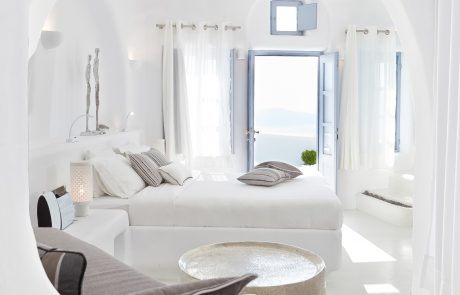 The interior of a bright and modern suite in Dana Villas, Santorini