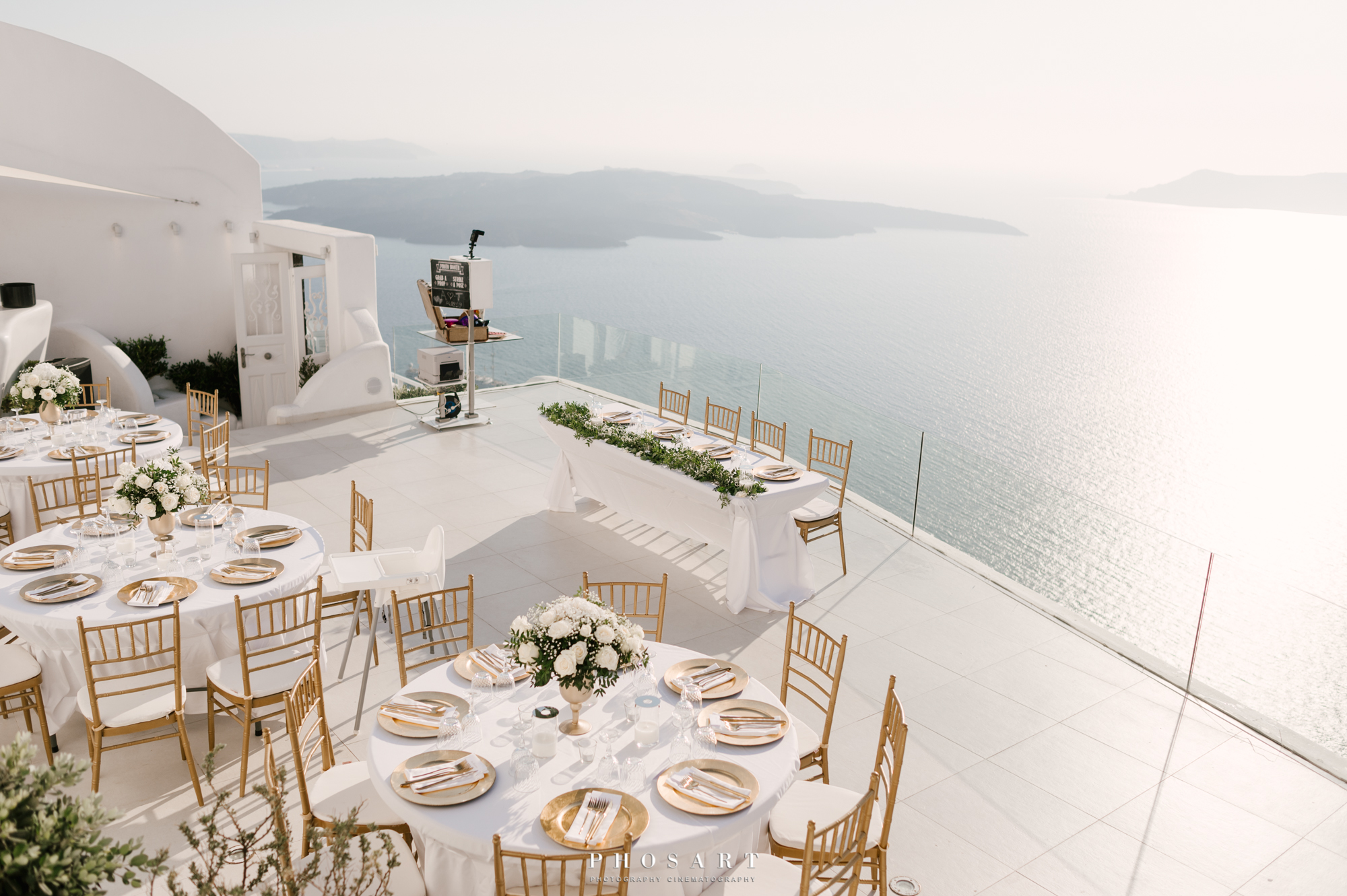 The terrace of Dana Villas decorated for a wedding event overlooking the Aegean Sea