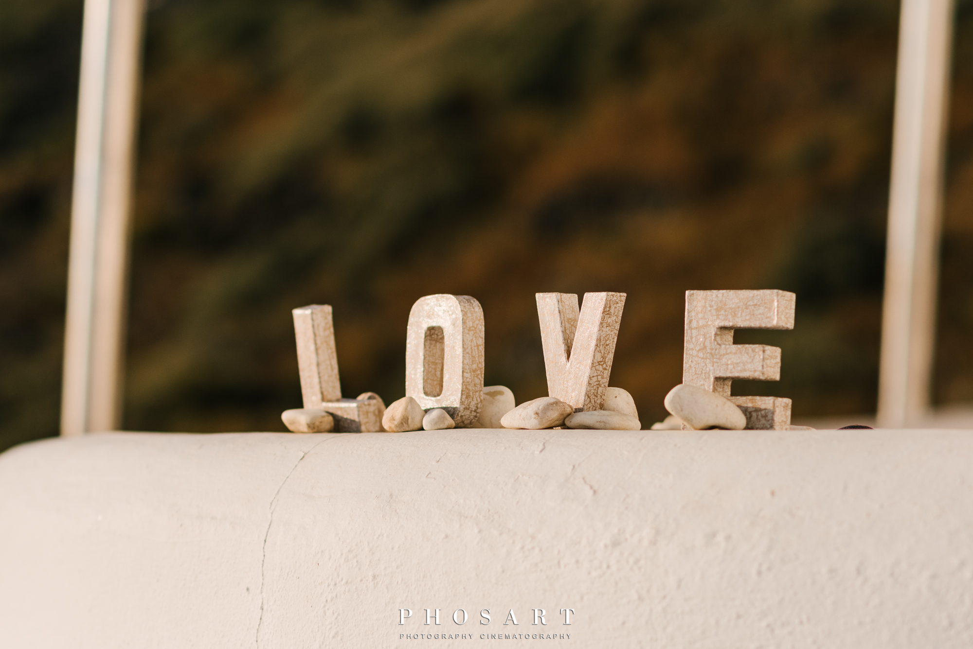 an ornament made of stone that shapes word love
