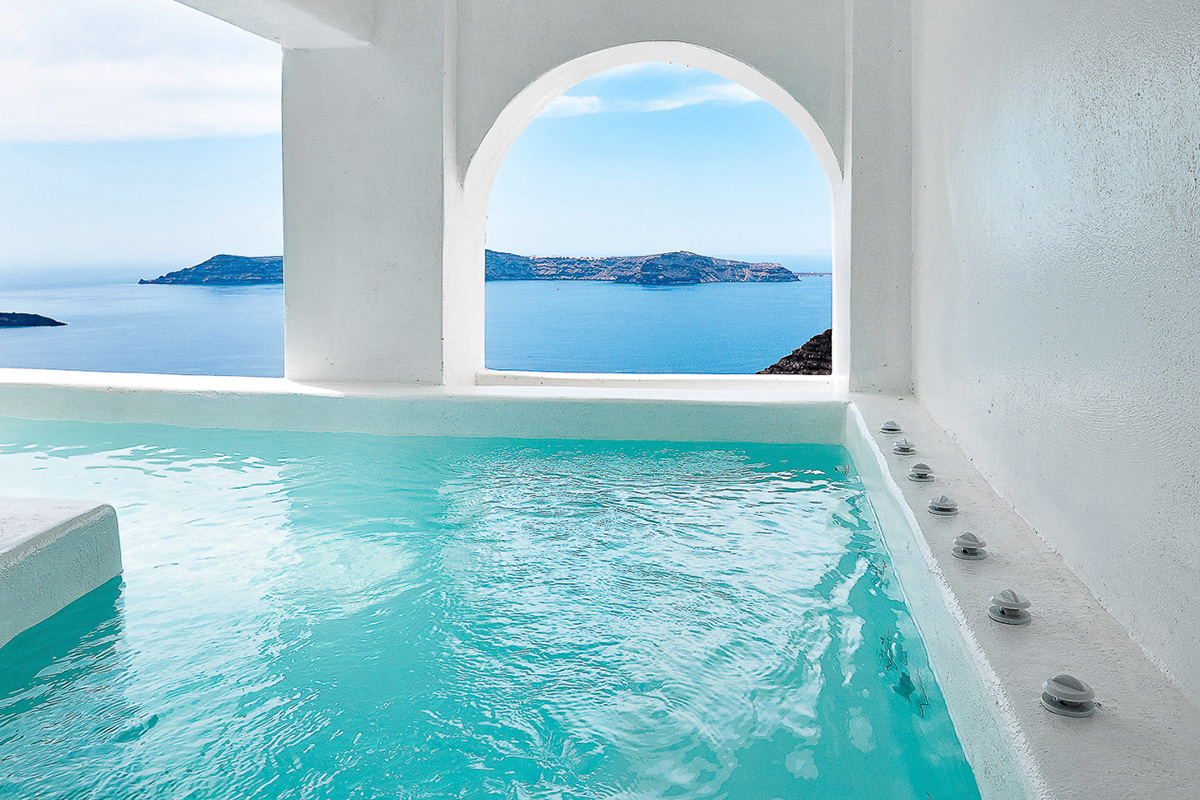 Dana Villas suite exterior and view from the cave pool over the Aegean Sea